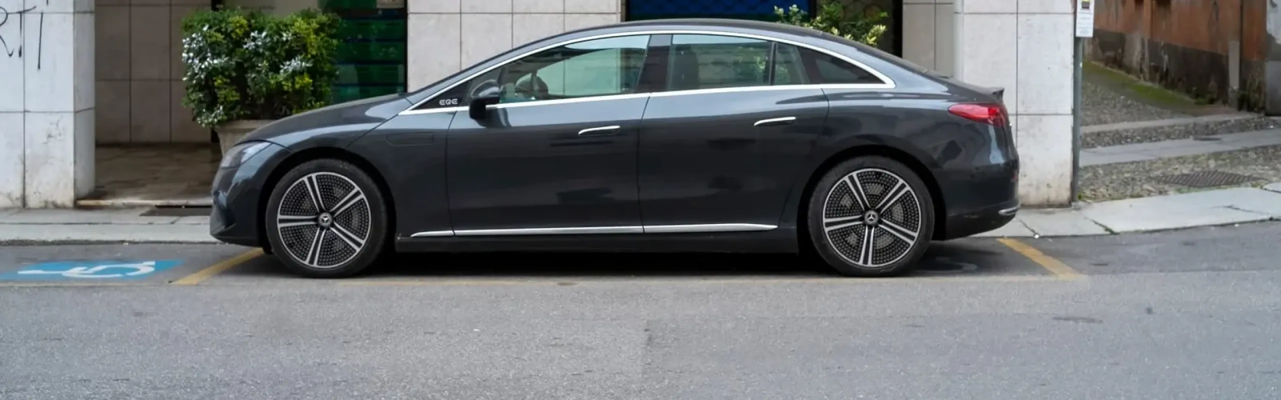 Interior of the Mercedes-Benz EQS (2024) chauffeur Manchester vehicle showing the electric executive cabin with leather seating and advanced MBUX technology