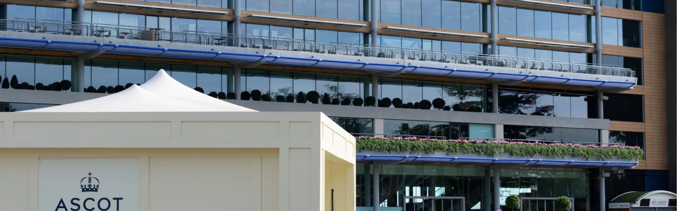 64391928 gazebo shelter below and in front of rear of modern spectator stands