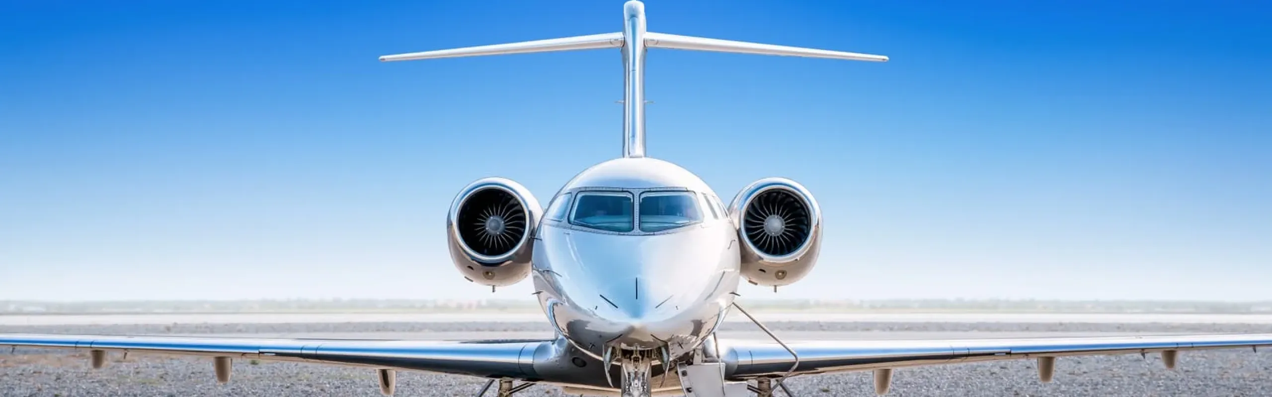 A luxury Mercedes-Benz S-Class waiting at the terminal for a private jet chauffeur Manchester arrival at Signature Flight Support