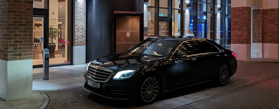 A luxury Manner Borne Mercedes-Benz business travel executive car providing a professional Prestbury chauffeur service for a client in the Cheshire Golden Triangle.