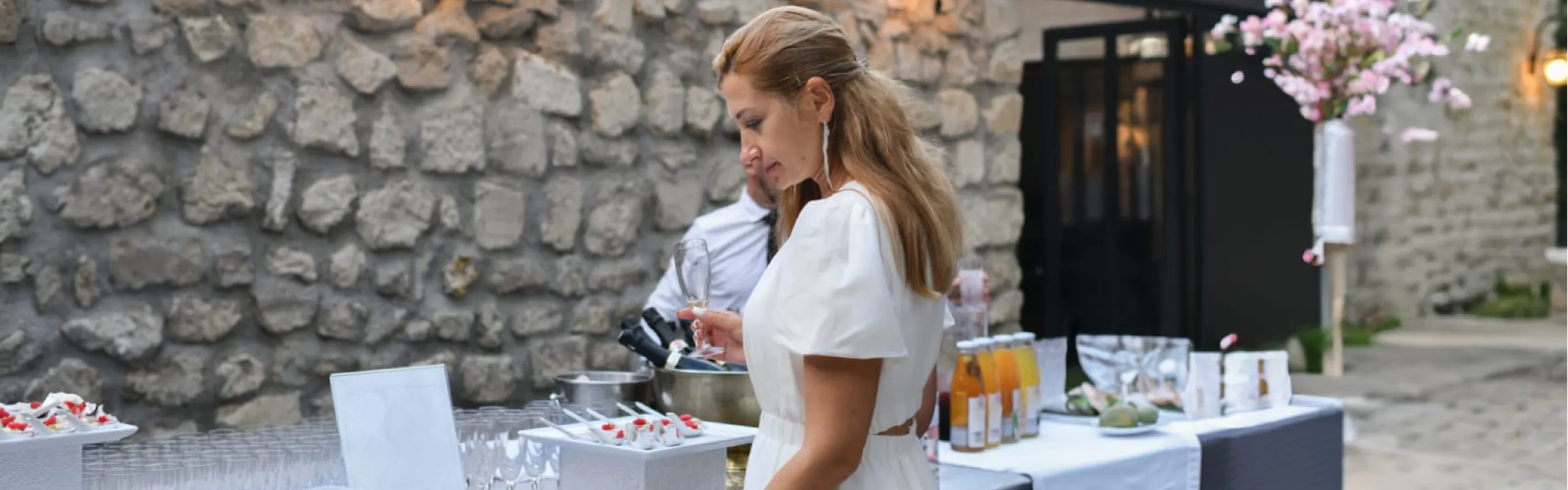 A luxury Manner Borne Mercedes-Benz wedding car parked at the entrance of Combermere Abbey, providing a premium chauffeur service for a Cheshire wedding.