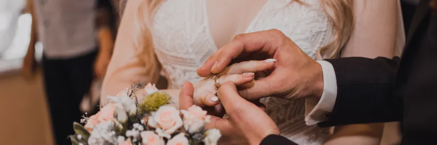 A luxury Mercedes-Benz S-Class wedding car parked in front of the historic Talhenbont Hall estate in North Wales.