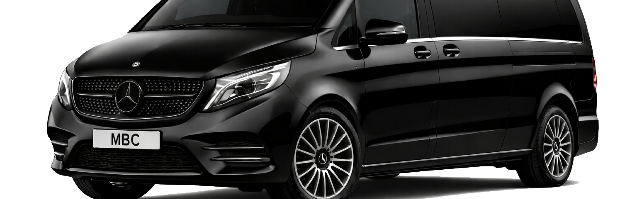 A luxury Mercedes-Benz V-Class from our golf chauffeur service North West parked outside a prestigious Royal golf club house with golf bags being loaded.