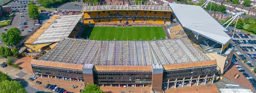 A luxury Mercedes-Benz chauffeur car arriving for a Molineux Stadium chauffeur service in Wolverhampton.