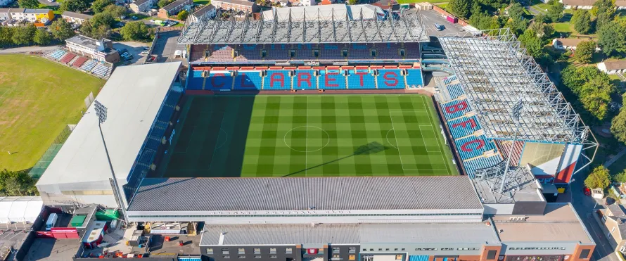 A professional Manner Borne vehicle providing a premium Turf Moor Stadium chauffeur service for football fans and corporate guests visiting Burnley FC.