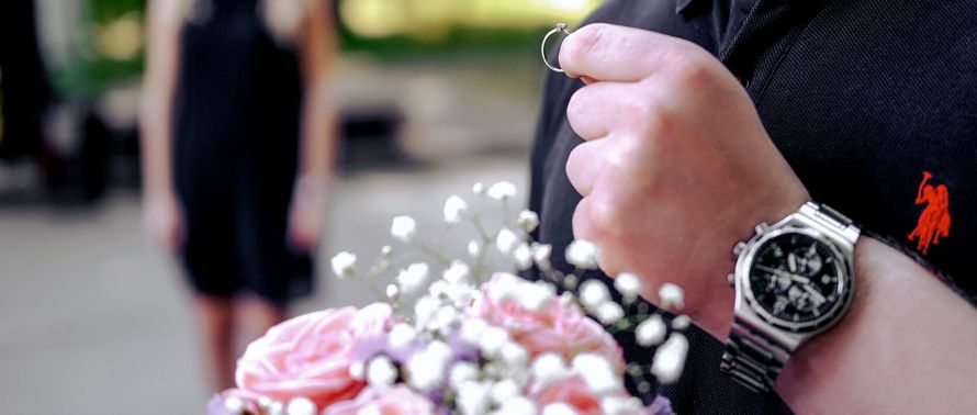 A luxury Mercedes-Benz chauffeur car decorated for a romantic occasion, perfect for those who plan to propose to a loved one in style.