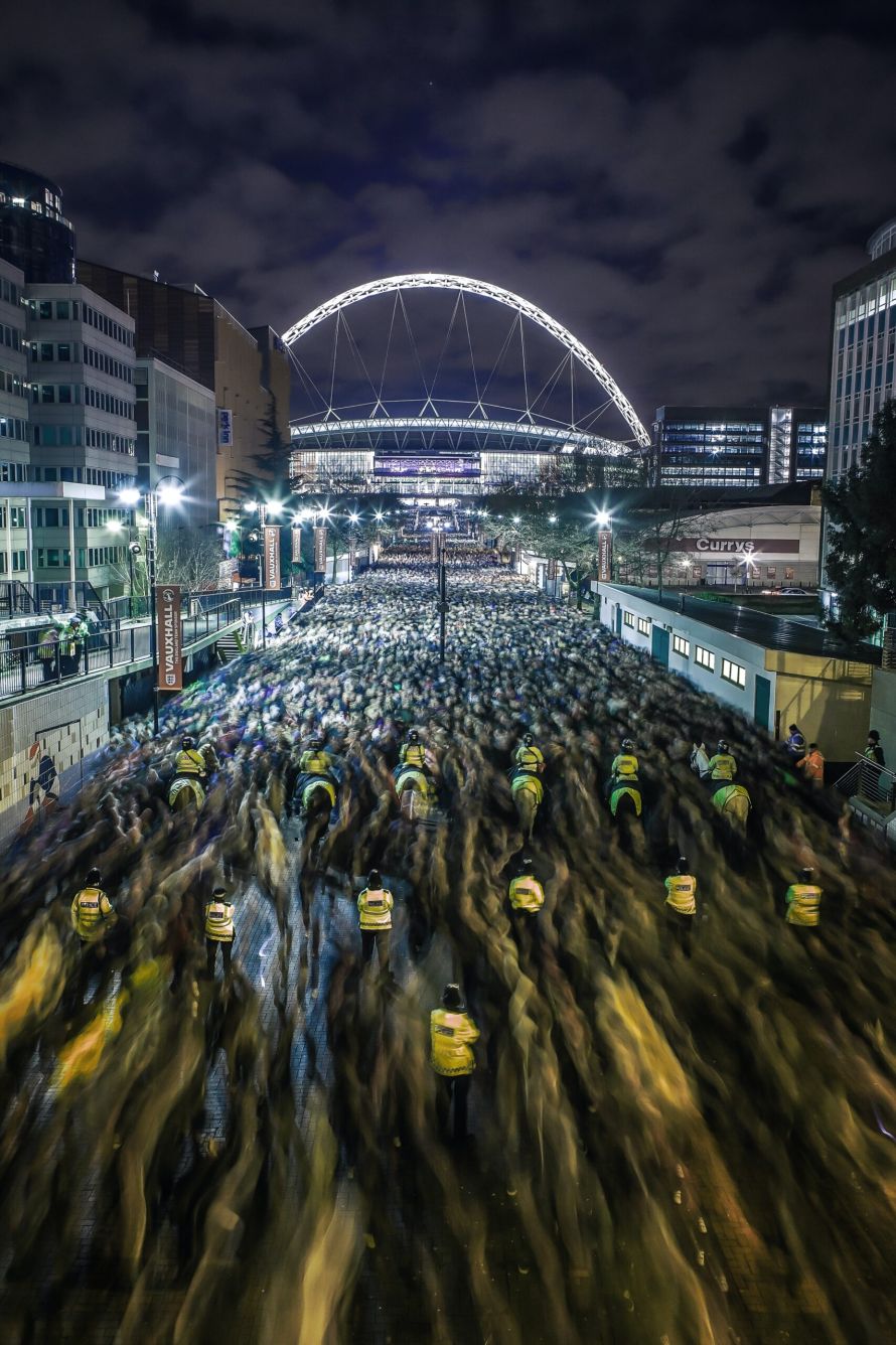 A luxury executive car parked outside Wembley Stadium for fans attending the Chelsea vs Crystal Palace FA Cup semi-final.