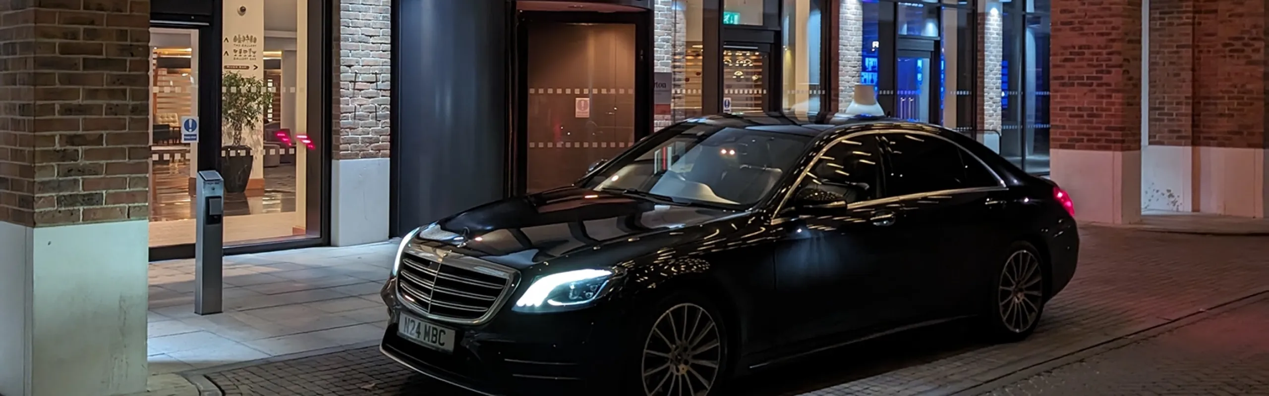 A luxury Manner Borne Mercedes-Benz business travel executive car providing a professional Prestbury chauffeur service for a client in the Cheshire Golden Triangle.