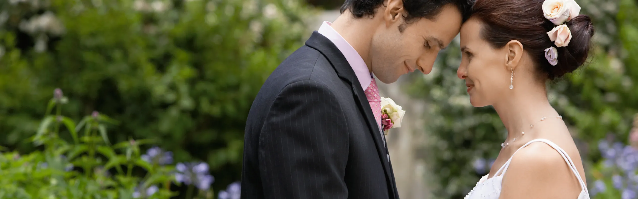 A luxury Manner Borne Mercedes-Benz wedding car parked at a beautiful venue, providing a professional Wrexham wedding chauffeur service for a North Wales couple.