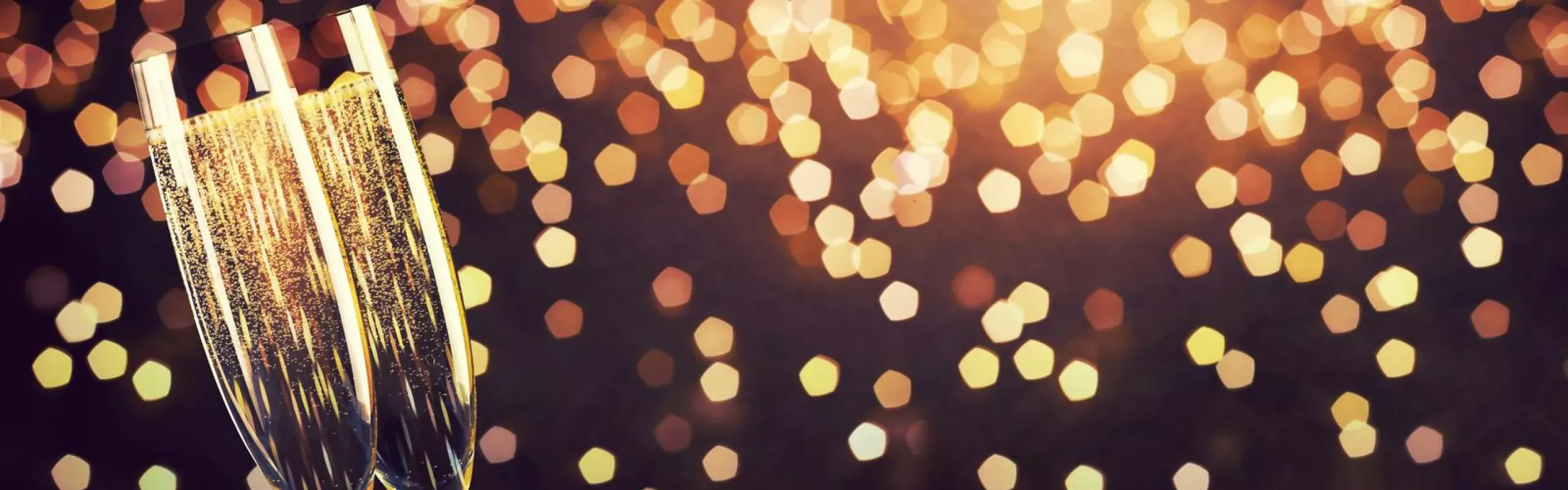 A luxury Mannerborne chauffeur car arriving at a Liverpool New Year party, ensuring stylish and safe transport for the celebrations.